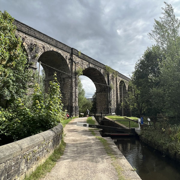 train bridge going over a canal